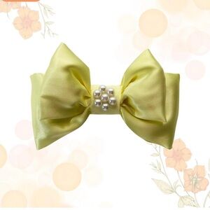 Elegant Yellow Bow with Pearl Accent